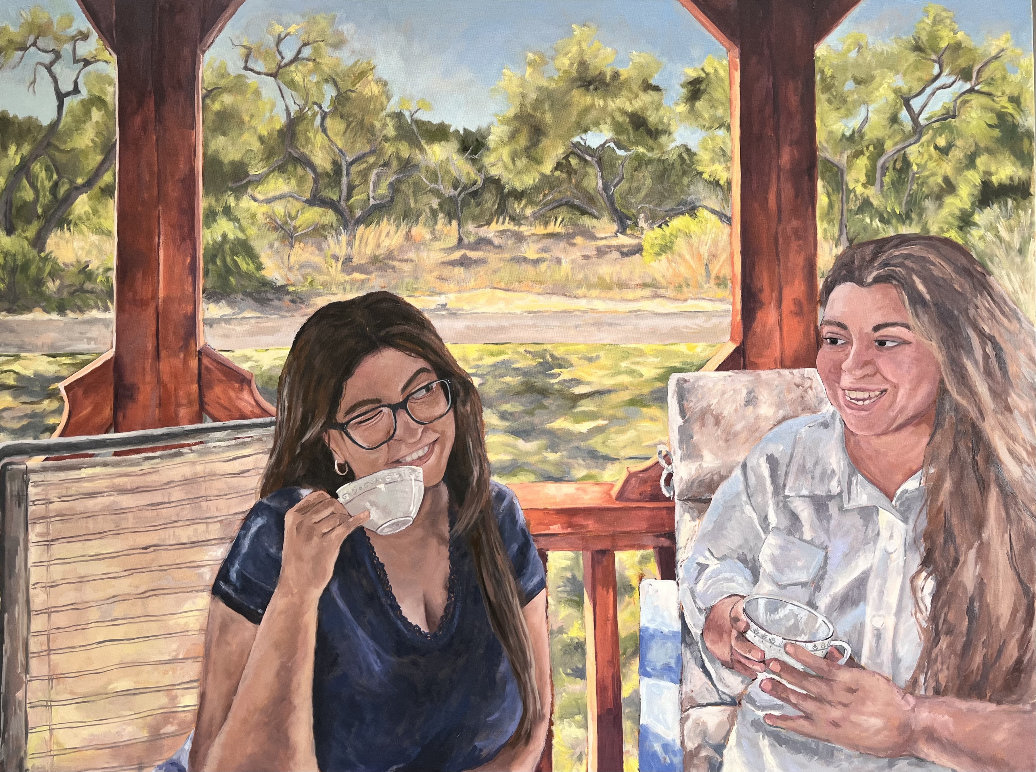 a woman and a girl holding teacups